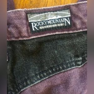 Fancy purple and black Rockies jeans. High rise.